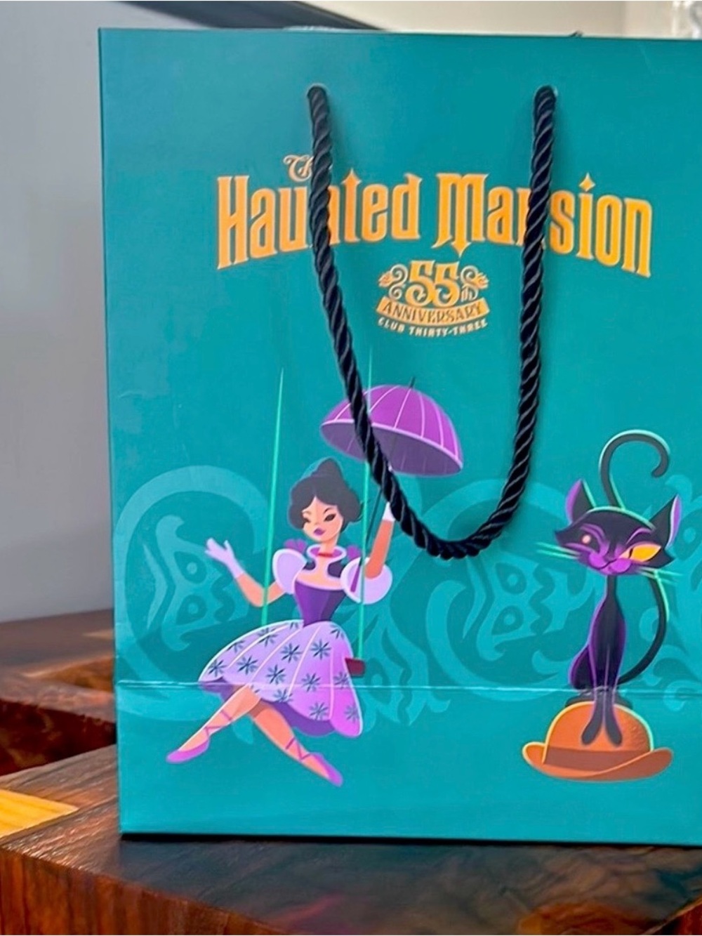 Disney Teal Gift Bag with Floral and Character Accents